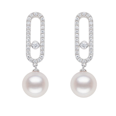These earrings feature a modern yet elegant design with a single link adorned with sparkling white diamonds and a drop of luminous Akoya pearl.