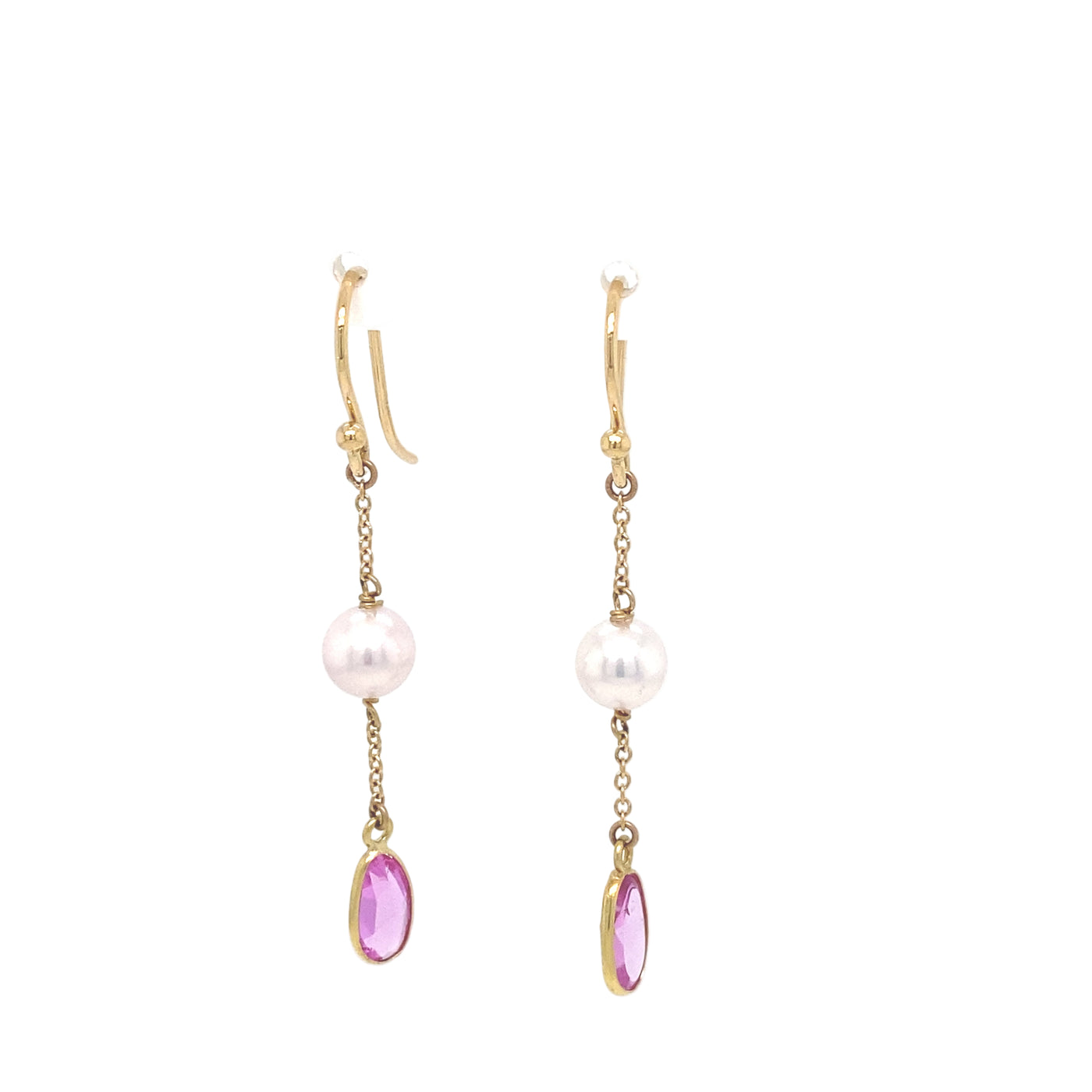 These drop earrings feature 6-6.5mm Akoya pearls suspended from an 18K yellow gold chain, accented with delicate pink sapphires.