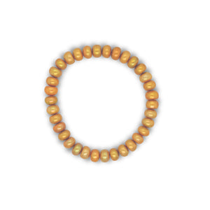 Bracelet with freshwater pearls in color amber. Stretchy and fits all. 