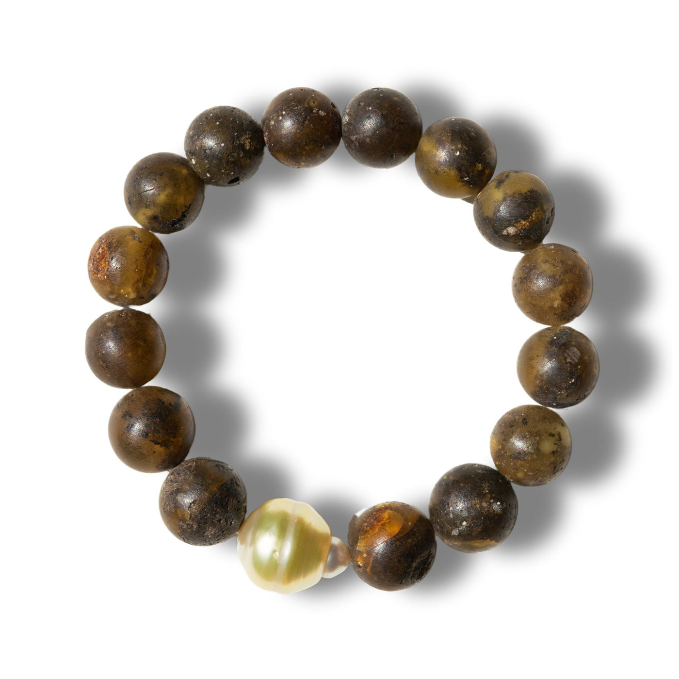 Discover the elegance of our Golden South Sea Pearl Men’s Bracelet, featuring 18K yellow gold and a unique mix of gemstones, including amber, tanzanite, lapis lazuli, green jade, Edo wood, and more. This sophisticated design blends luxury and natural elements, creating a bold statement piece for the modern man. Perfect for collectors and those who appreciate refined craftsmanship.