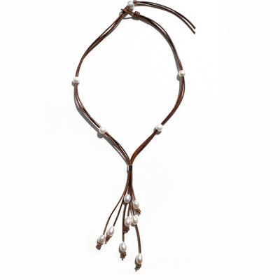 A perfect blend of western style and versatility with our Freshwater Pearls and Bolo Necklaces. Designed for everyday wear, brown, blue or black leather.