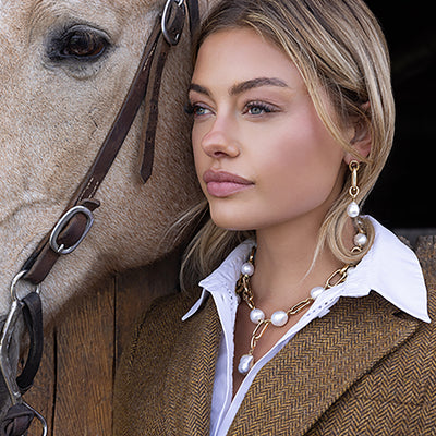 Amalfi Necklace with Italian link chains in 18K Gold featuring white south sea pearls and a south sea baroque pearl charm enhancer also in 18K Yellow Gold. 