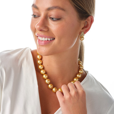 Luminous Golden South Sea Pearl earrings from our new Pearls by Shari, Butterly Collection, featuring your choice of 18K White or Yellow gold and shimmering white and yellow diamonds.