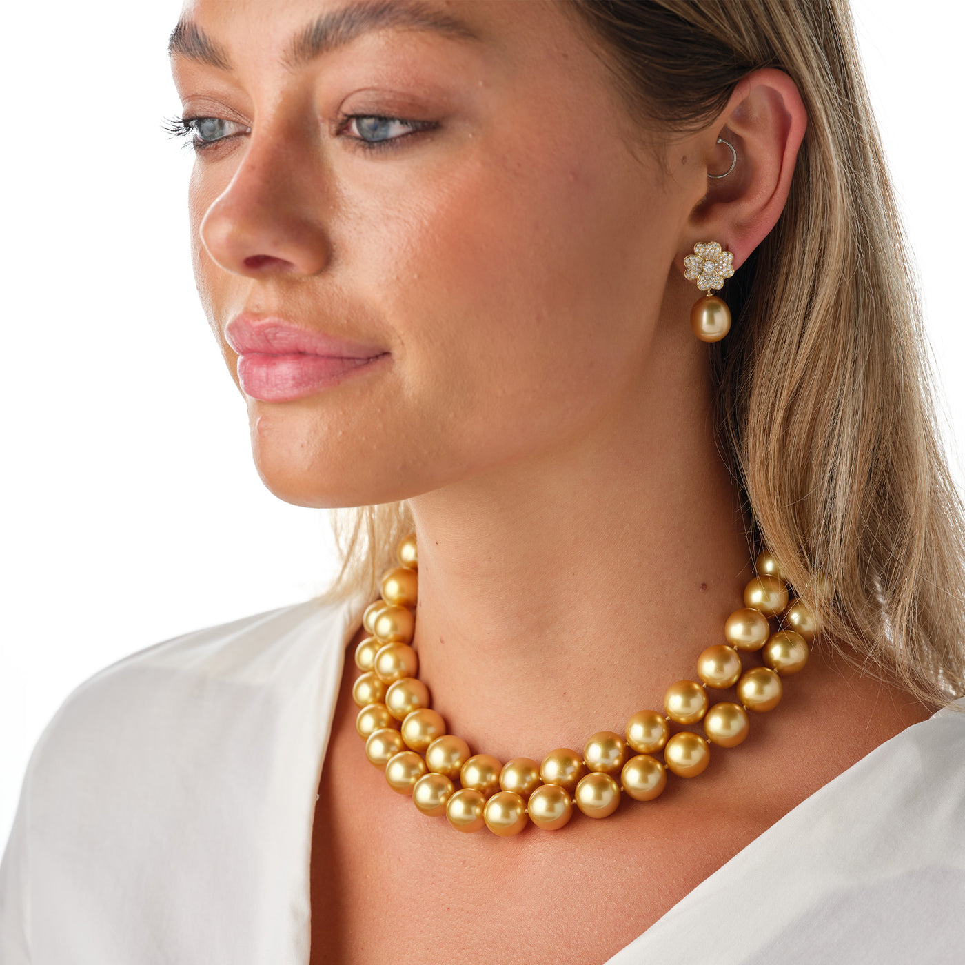 Empress Golden South Sea Necklace worn by a model with Diamond Flower earrings