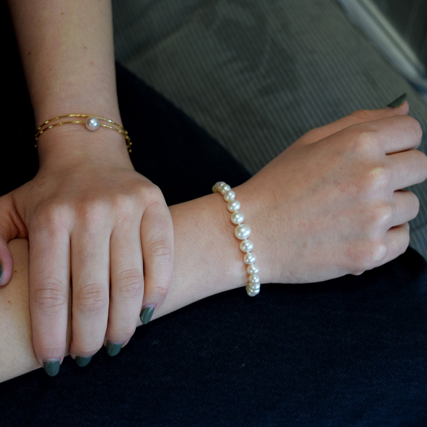  Graduating Freshwater Pearl Bracelet. With a circular golden clasp, is perfect for layering. 