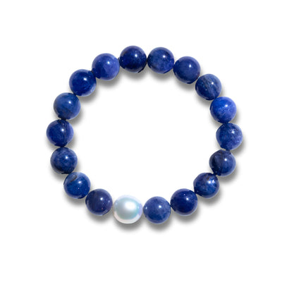 Discover the elegance of our Golden South Sea Pearl Men’s Bracelet, featuring 18K yellow gold and a unique mix of gemstones, including amber, tanzanite, lapis lazuli, green jade, Edo wood, and more. This sophisticated design blends luxury and natural elements, creating a bold statement piece for the modern man. Perfect for collectors and those who appreciate refined craftsmanship.