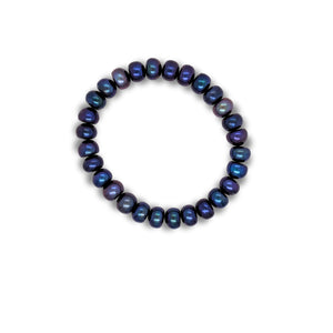 Freshwater Stretchy bracelet inspired by night skiing featuring Prussian blue color hues. 