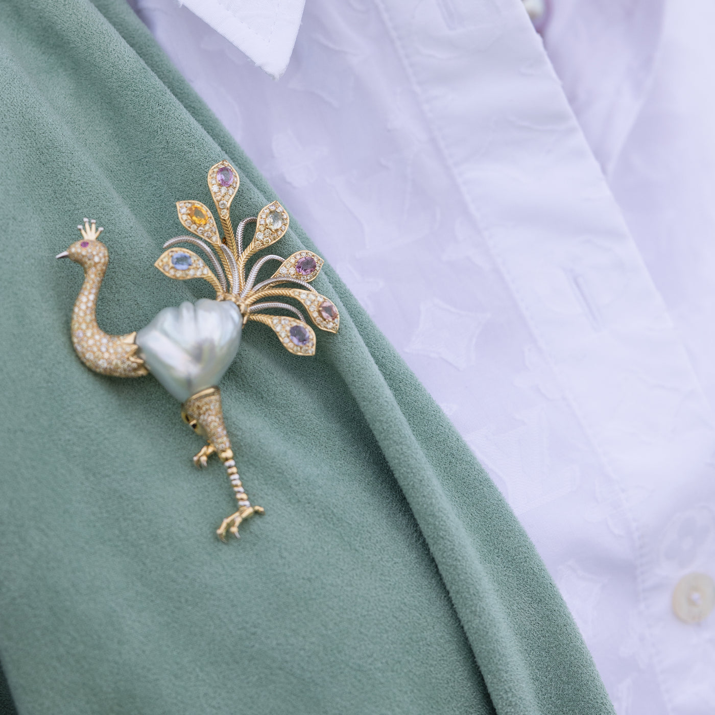 Limited edition Ostrich Brooch-a true work of art. It features a stunning South Sea Pearl as the body of the bird, adorned with sparkling sapphires and diamonds. 
