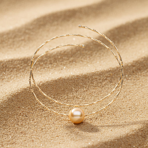 Discover the fun and trendy allure of our Double Sparkle Bangle Bracelet! Featuring a radiant 9.5-10mm Golden South Sea Pearl, this piece combines elegance with a touch of sparkle.