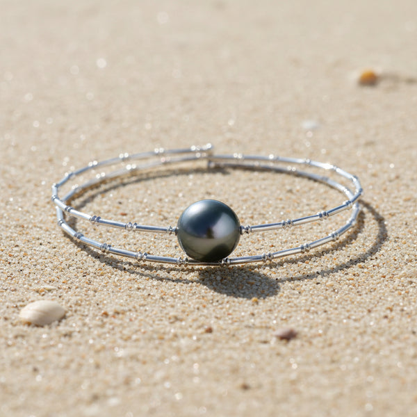 Discover the fun and trendy allure of our Double Sparkle Bangle Bracelet! Featuring a radiant 9.5-10mm Golden South Sea Pearl, this piece combines elegance with a touch of sparkle.